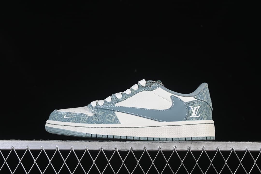 Side profile of a white and blue Jordan 1 Low sneaker with denim-style patterned panels