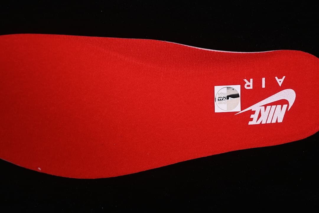 Red insole with visible Nike branding