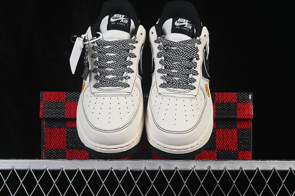 Front view of the pair showing perforated toe panels and black-and-white laces