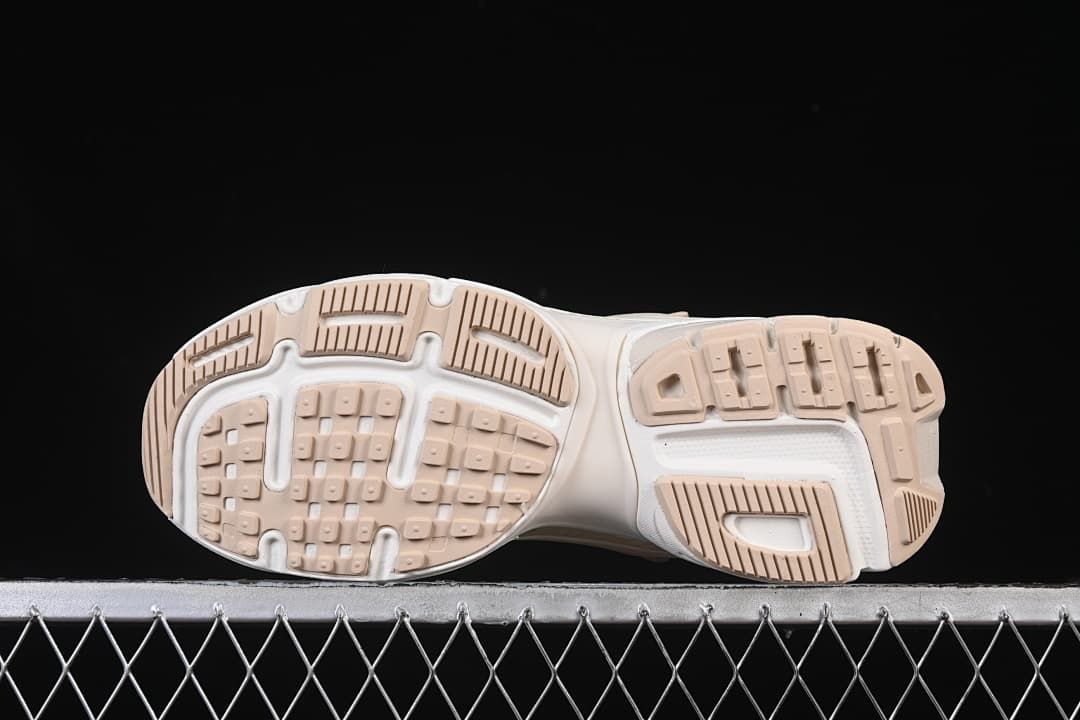 Underside view showing the patterned outsoles