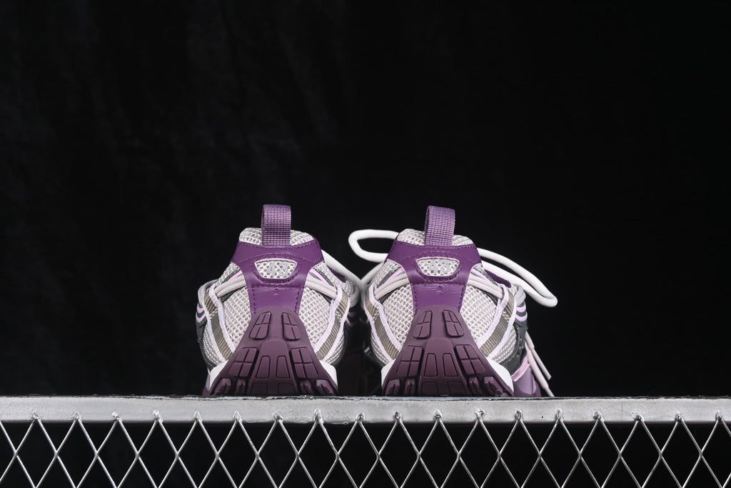 Rear view of the pair showing purple heel pull tabs, mesh heel sections, and textured outsole details.