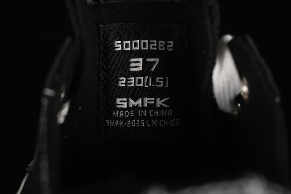 Close-up of the shoe tongue showing S0002B2 and size markings.