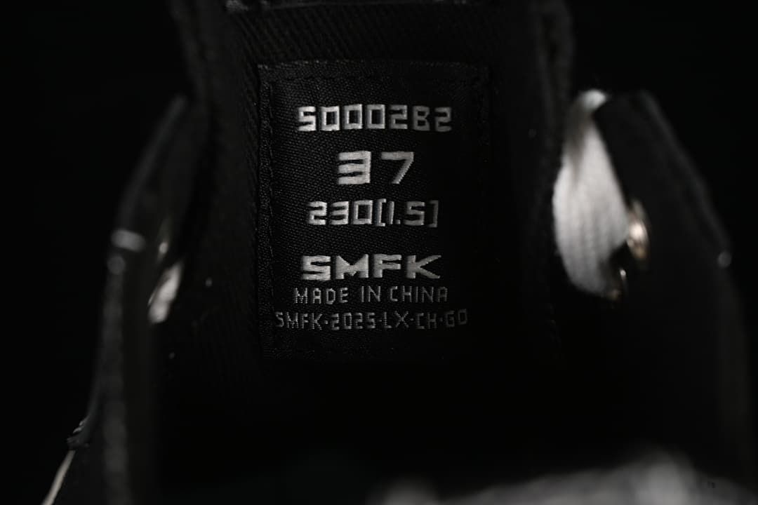 Close-up of the shoe tongue showing S0002B2 and size markings.