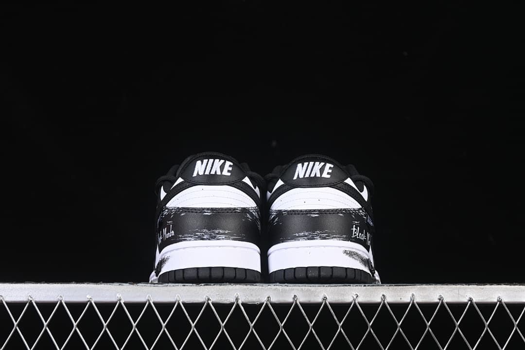 Rear view of both shoes showing heel panels and outsoles