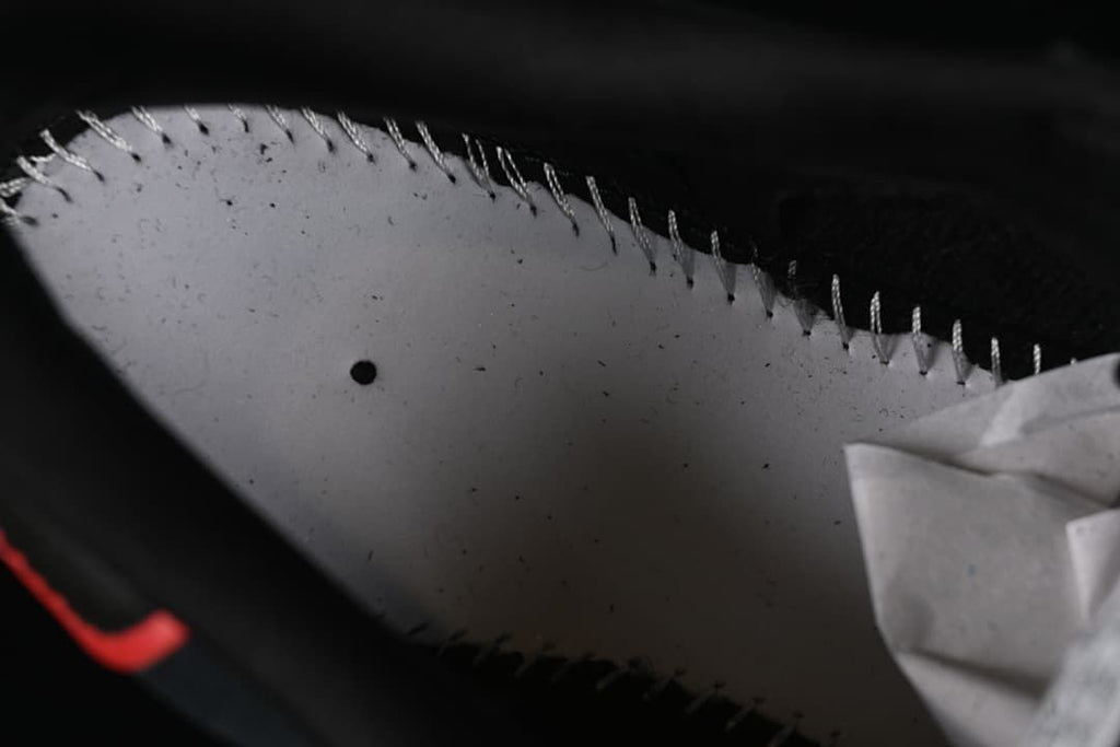 Close-up of the sneaker's inner construction and stitching