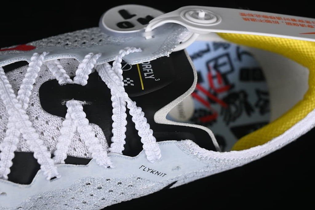 Close-up of the laces, tongue, and interior of the shoe