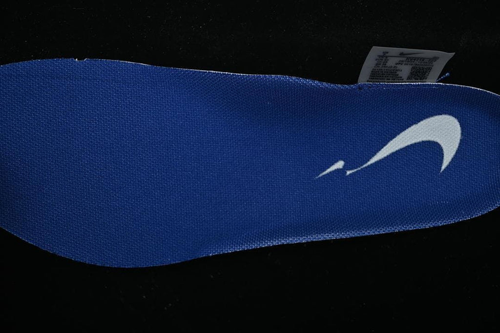 Close-up of a blue shoe insert with a white logo