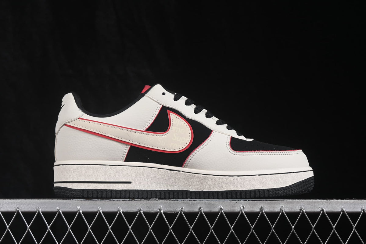 Side profile highlighting the white upper, black panels, outlined Swoosh and black outsole.