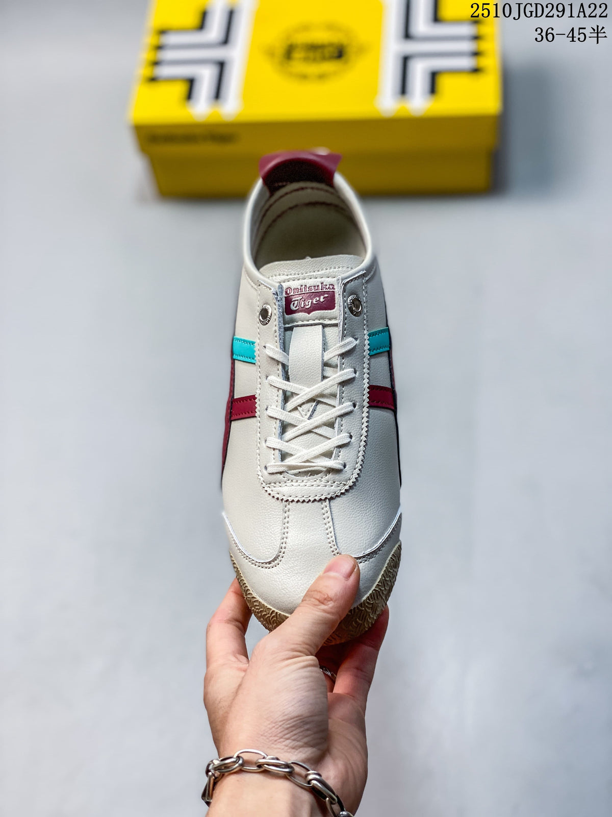 Front view of an off-white lace-up sneaker with burgundy and turquoise side accents.