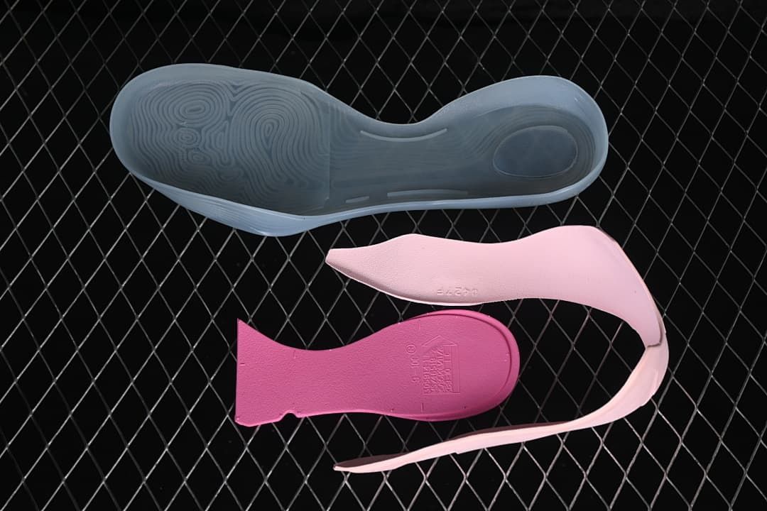 Outsole and removable insole components shown separately