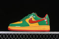 Side profile of a green, yellow, and red Nike Air Force 1 ’07 Low