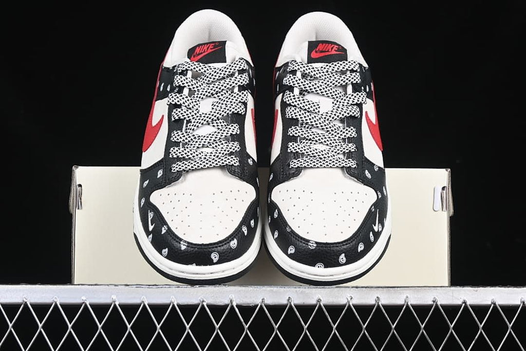 Front view of both sneakers showing perforated toe boxes and patterned laces.