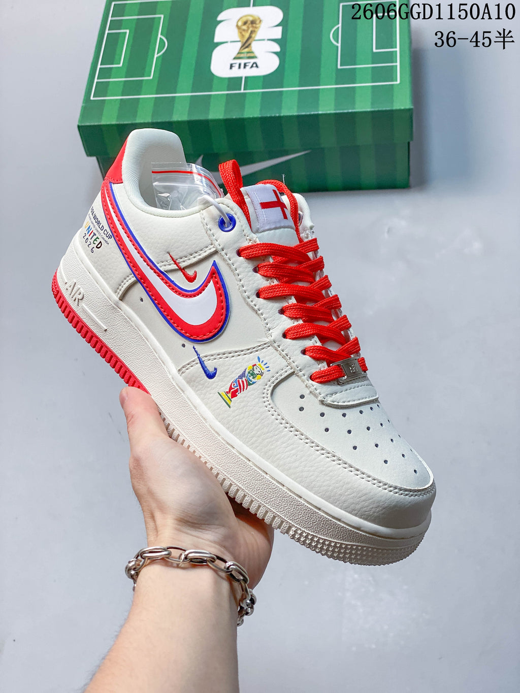 Angled close-up of the sneaker with red laces, side graphics, and contrasting outsole