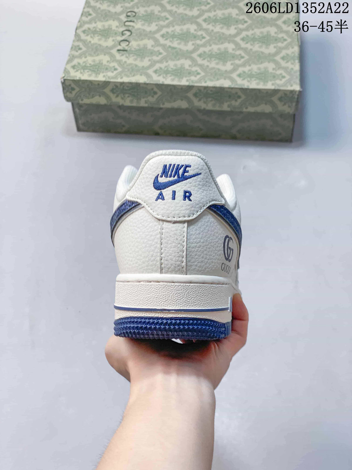 Rear view of a white sneaker with blue accents and visible Nike Air and Gucci branding; image text shows style code 2606LD1352A22 and size range 36–45.5.