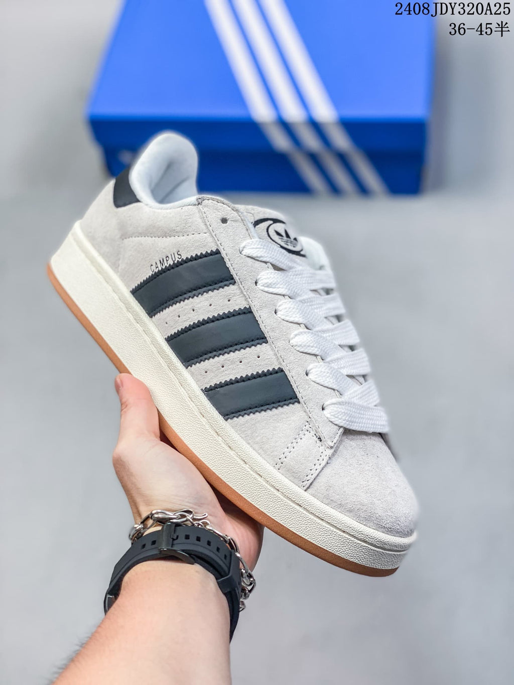 Side view of a light gray Adidas Campus 00s sneaker with black stripes