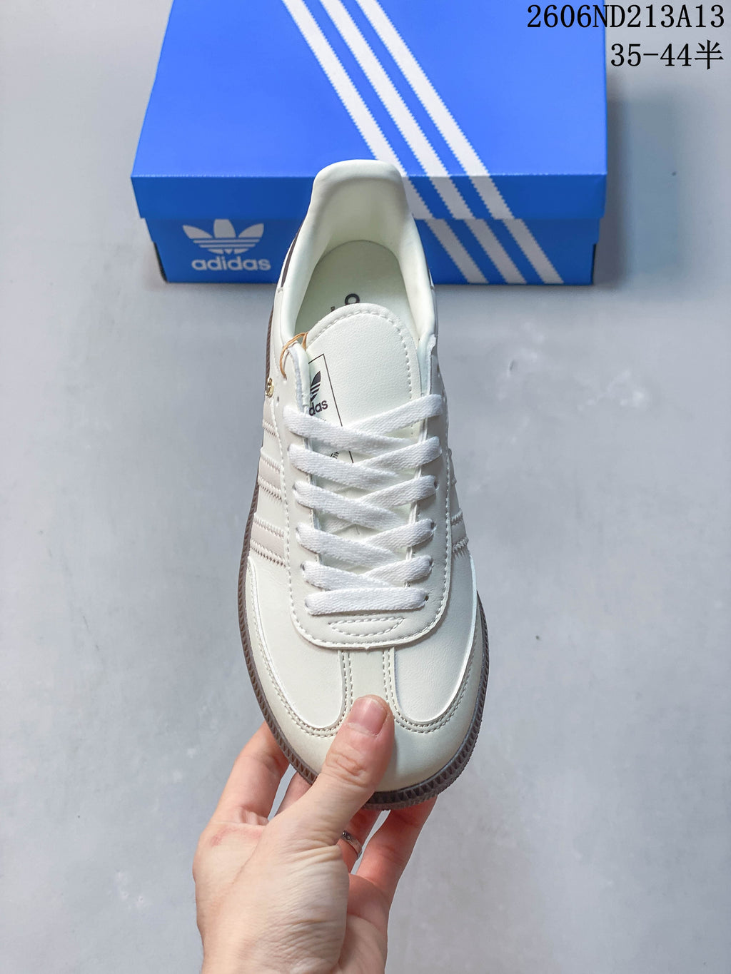 Top view of a white adidas Samba OG sneaker with lace-up fastening