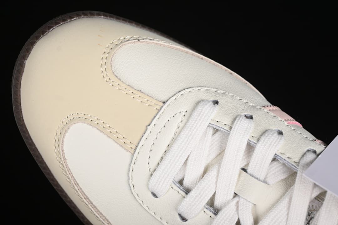 Close-up of the sneaker toe and white lace area