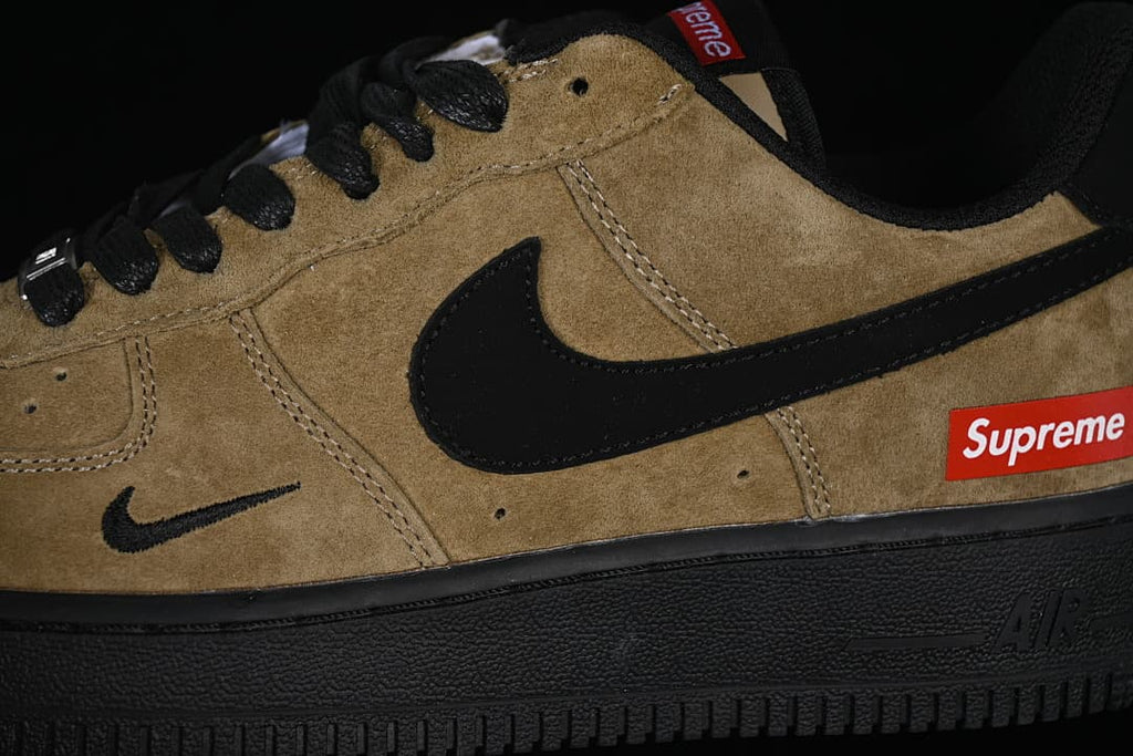 Close-up of the side Swoosh and red Supreme label