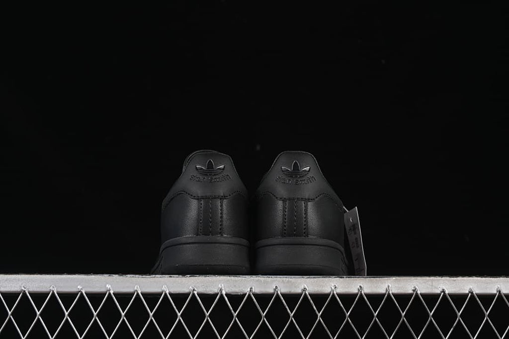 Rear view of both sneakers showing heel details