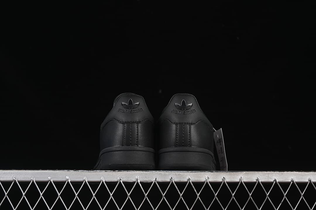 Rear view of both sneakers showing heel details