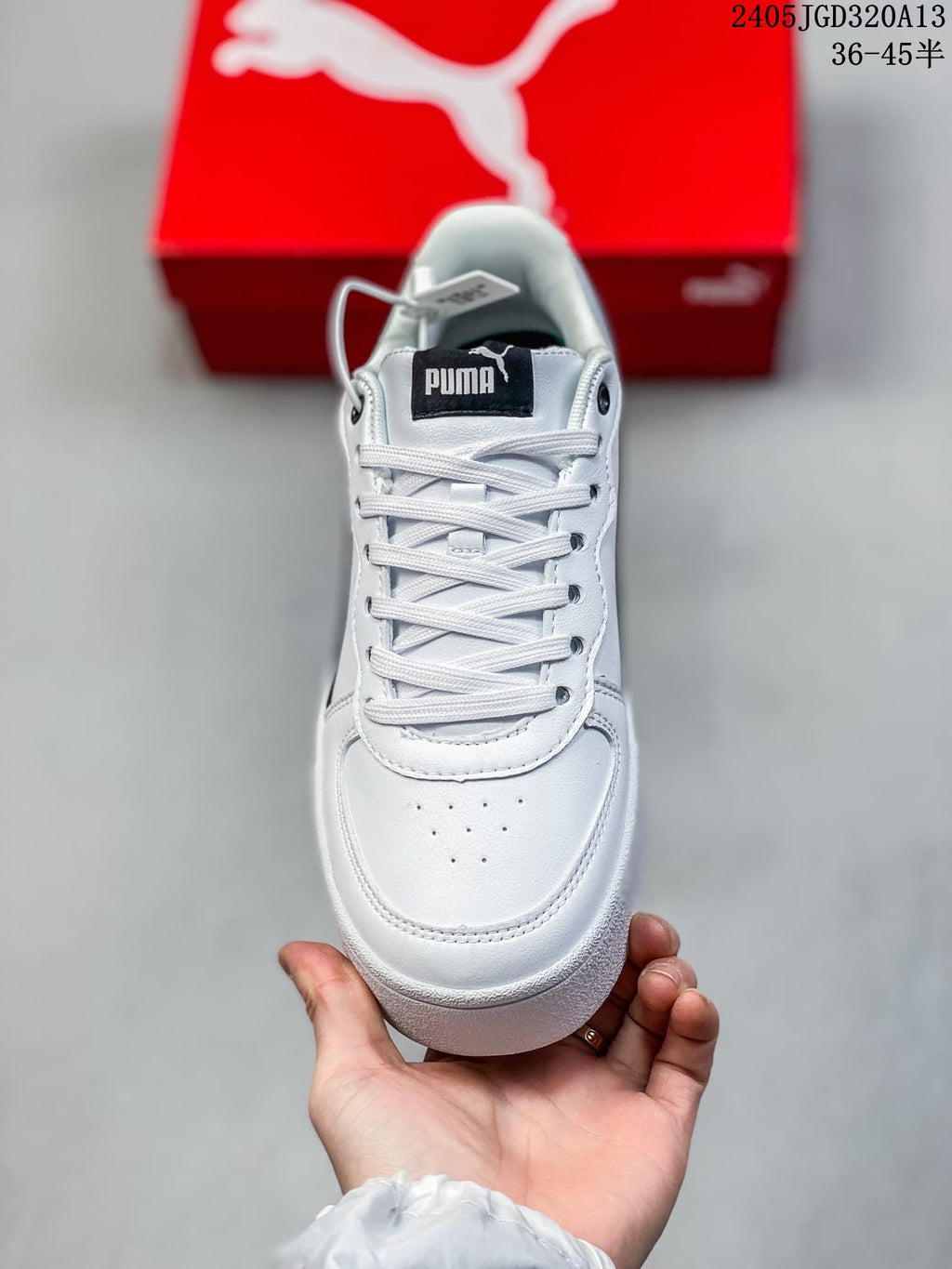 Front view showing white laces and a perforated toe