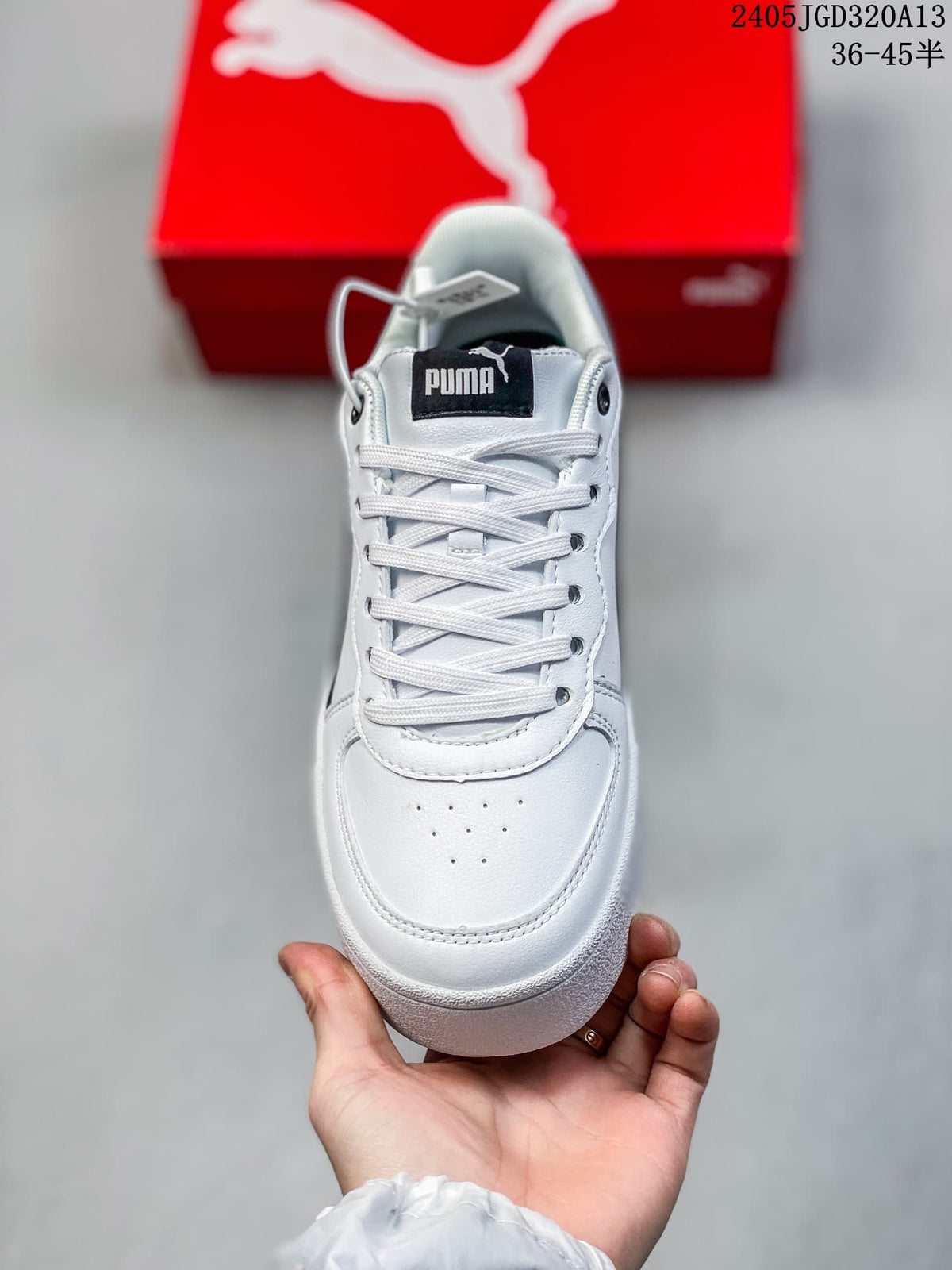 Front view showing white laces and a perforated toe