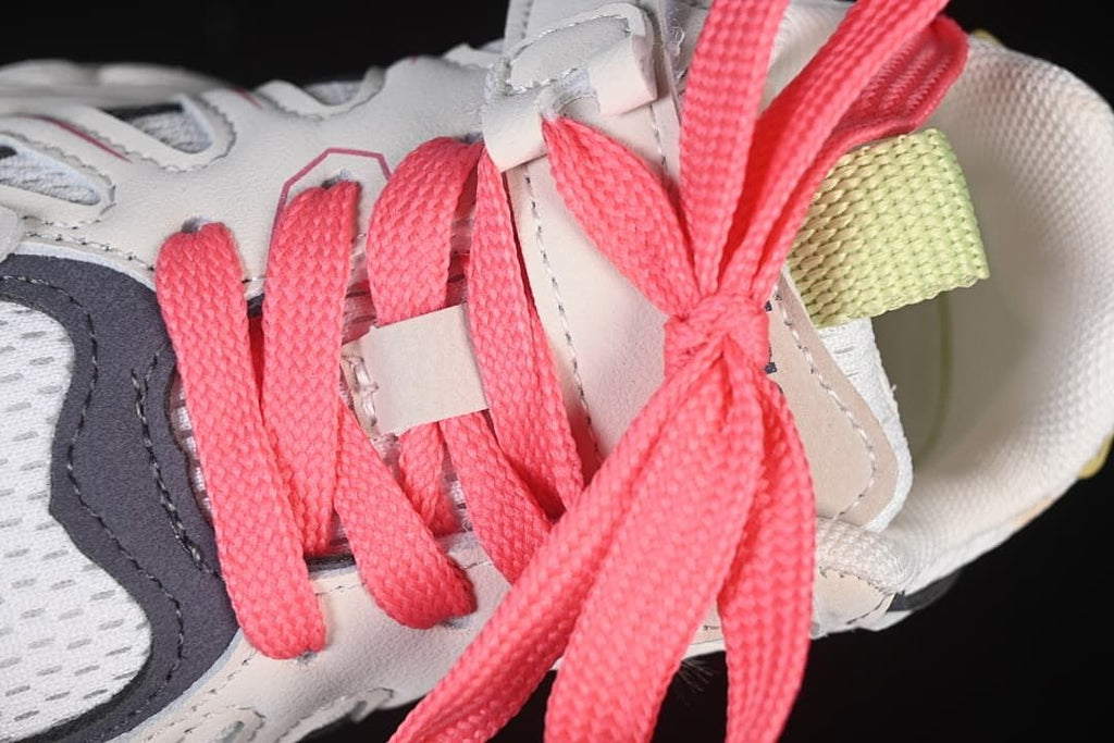 Close-up of the pink laces and upper details.