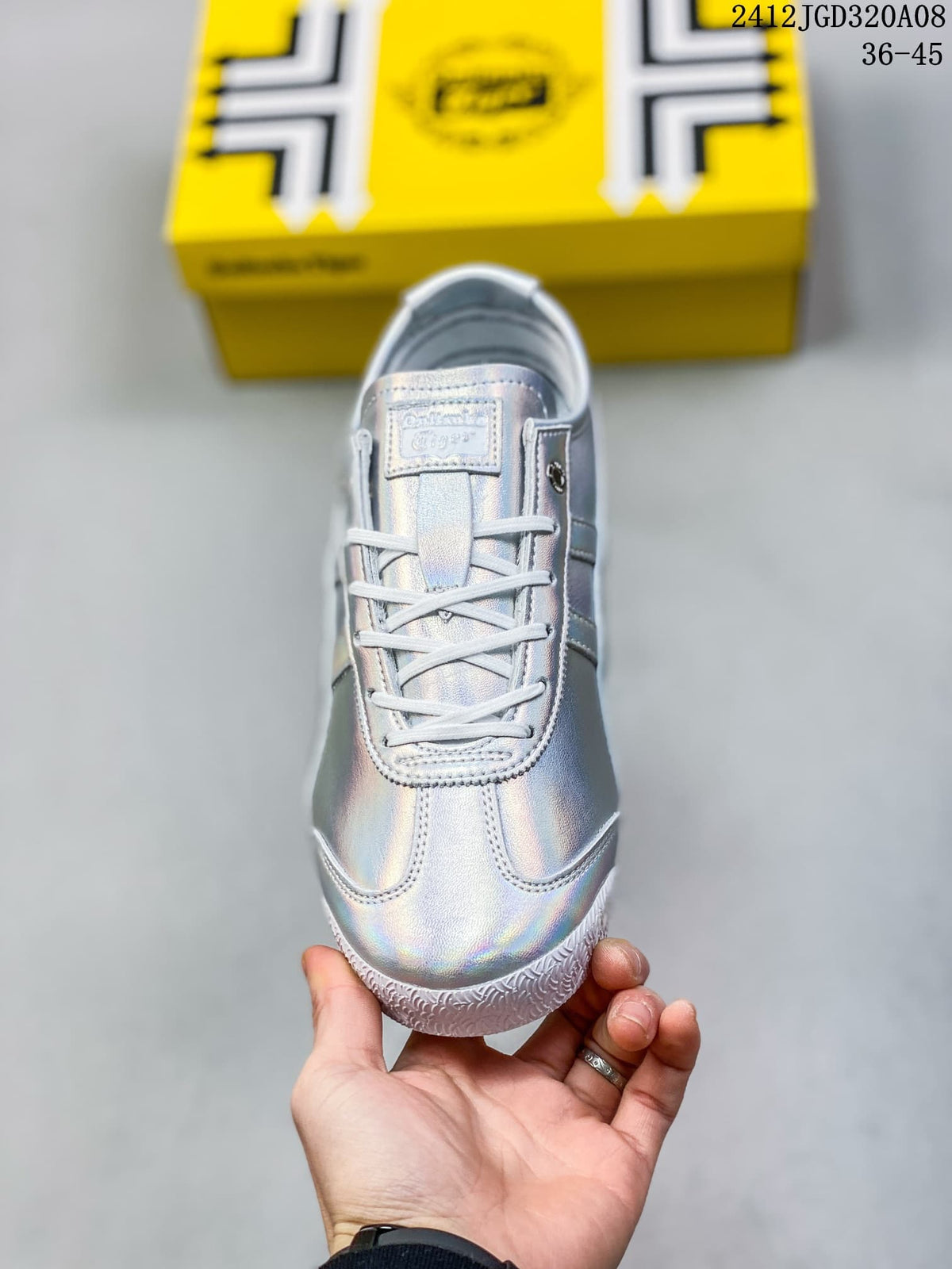 Front view of an iridescent silver lace-up sneaker