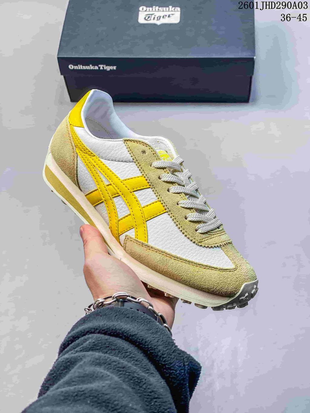 White Onitsuka Tiger EDR 78 sneaker with yellow side stripes and beige panels.