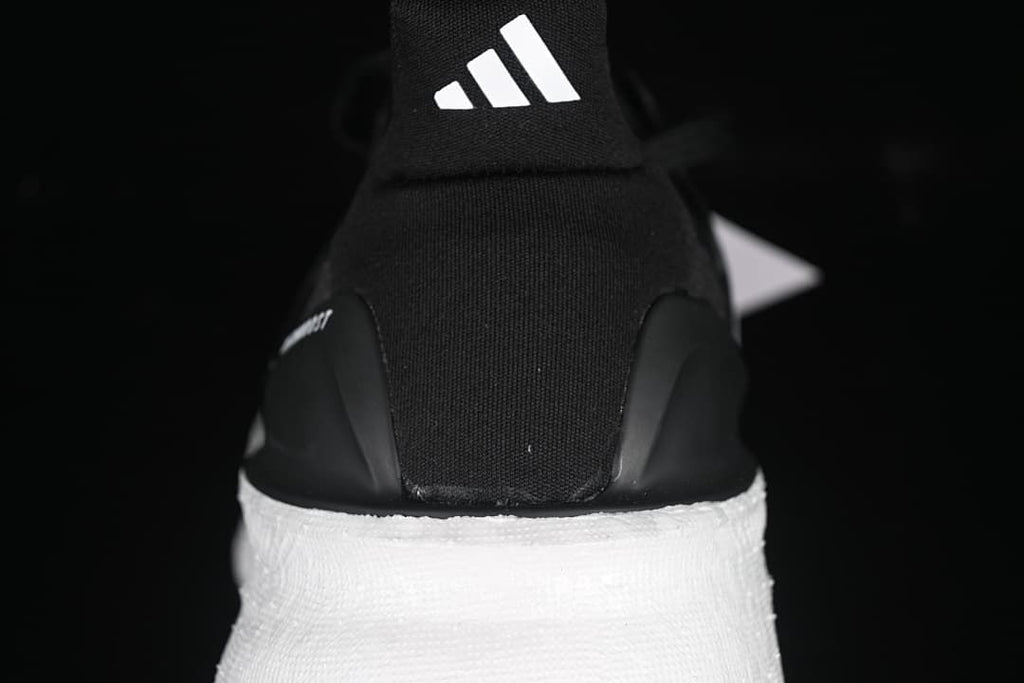 Rear view of the Adidas Ultraboost 5 showing the heel tab and white midsole