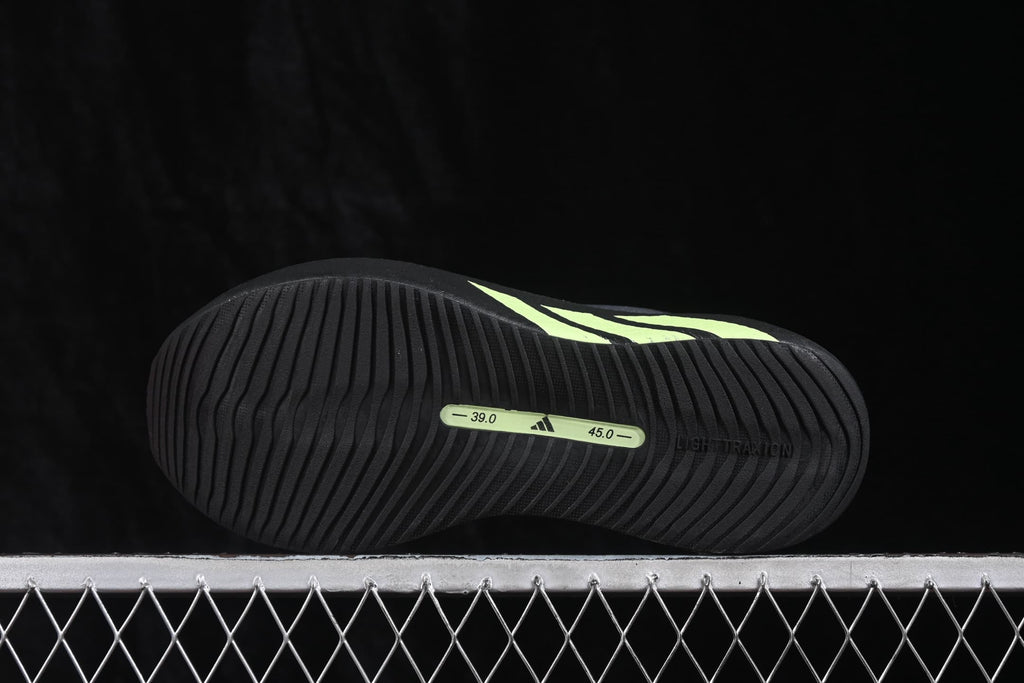 Bottom view of the black outsole showing curved traction grooves and size markings including 39.0 and 45.0.