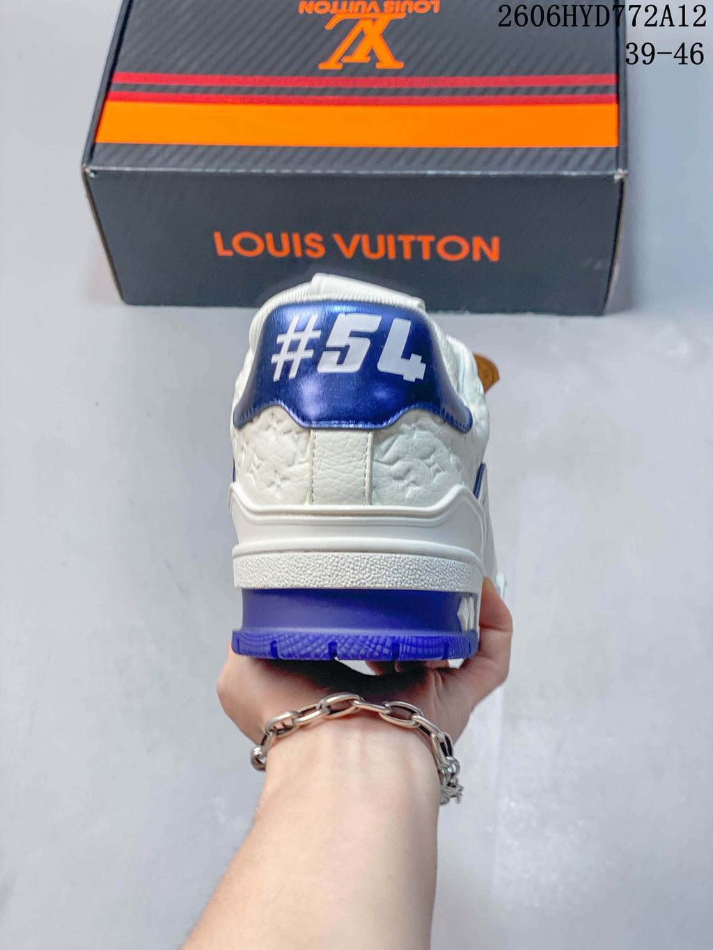 Rear view of the sneaker showing its blue heel detail