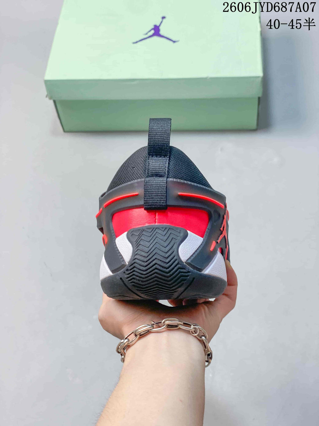 Rear view of the Jordan Heir PF shoe showing the heel and outsole