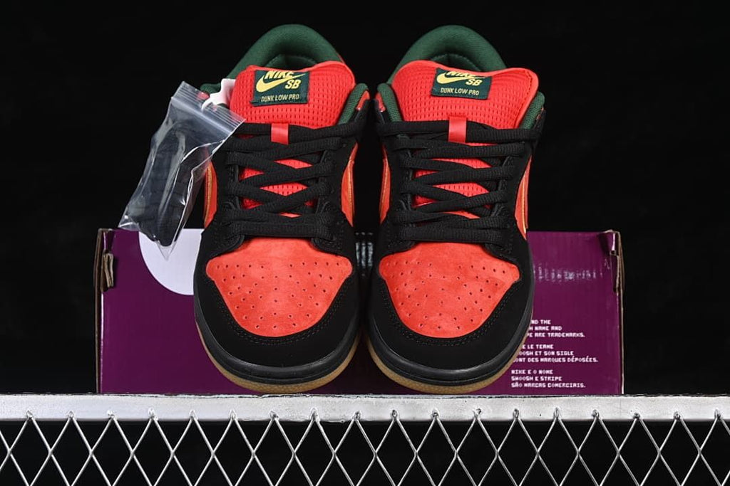 Front view of the pair showing perforated red-orange toe boxes, black overlays, and red tongues.