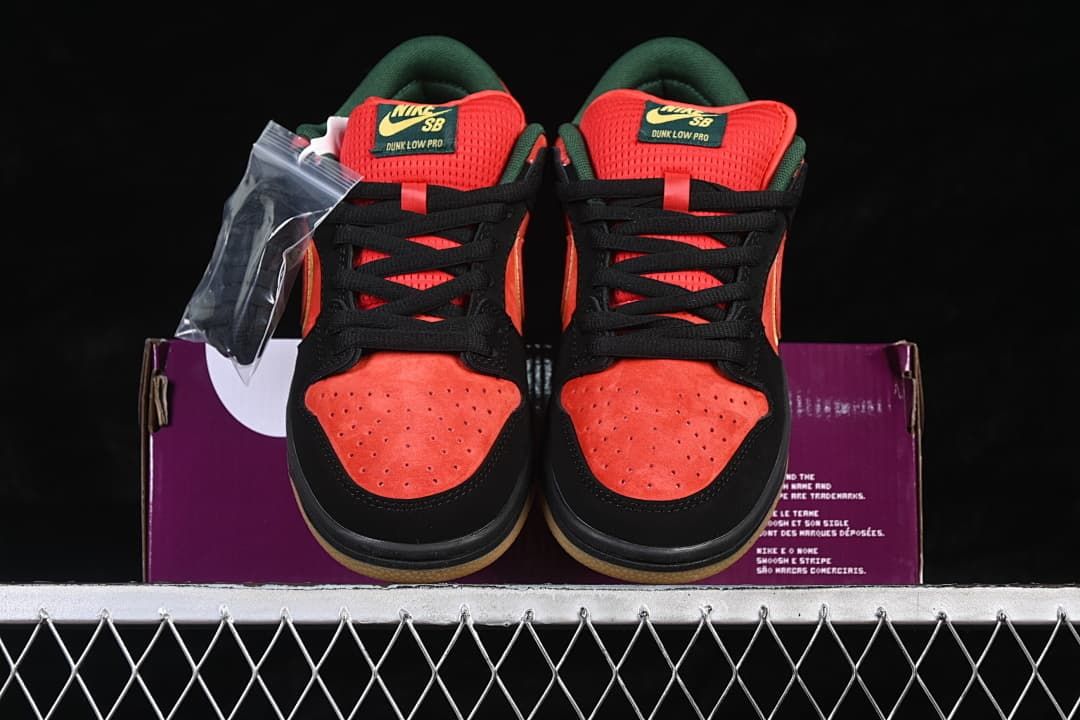 Front view of the pair showing perforated red-orange toe boxes, black overlays, and red tongues.