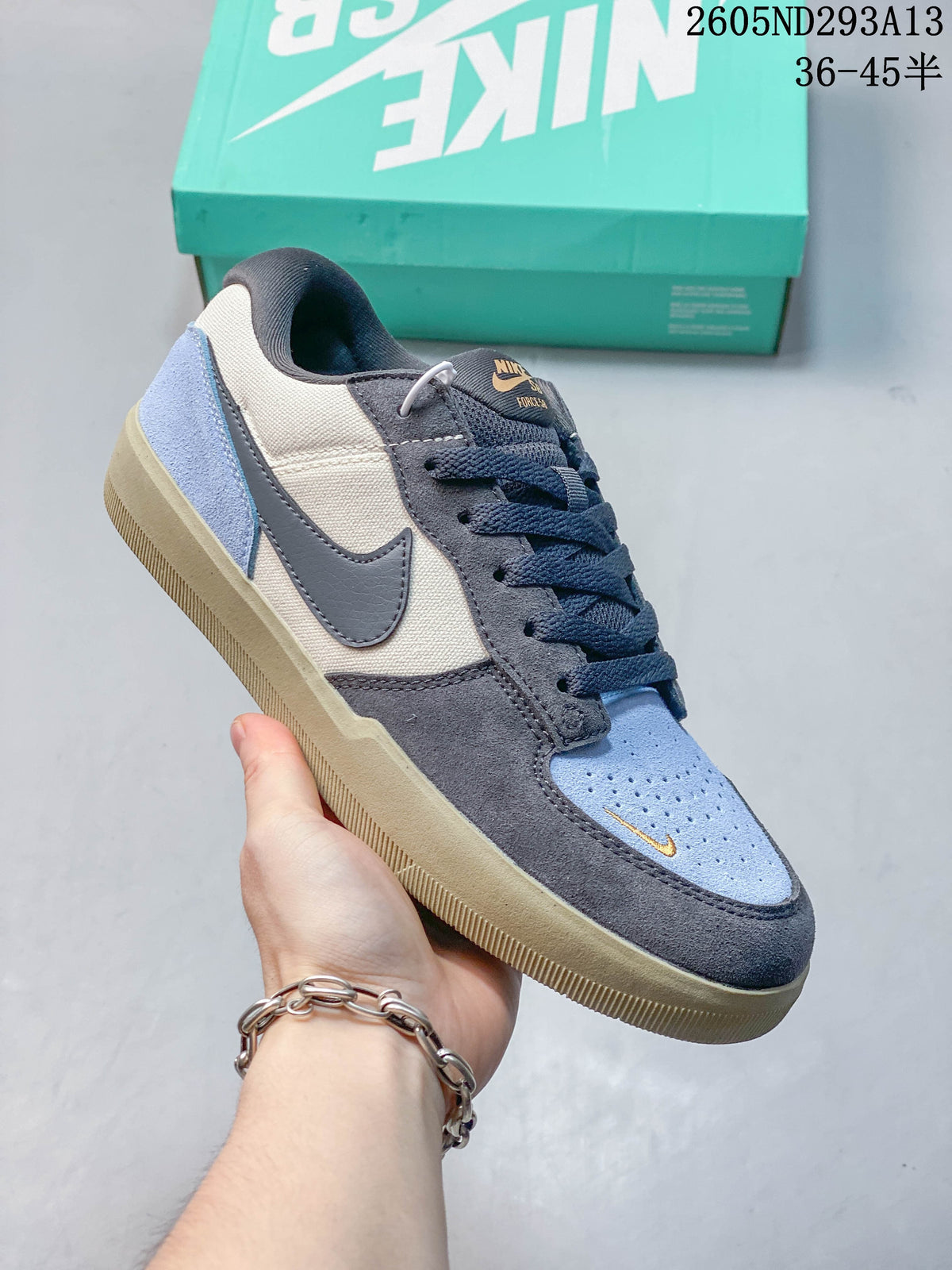 Angled side view of the low-top shoe with a gum-colored outsole.