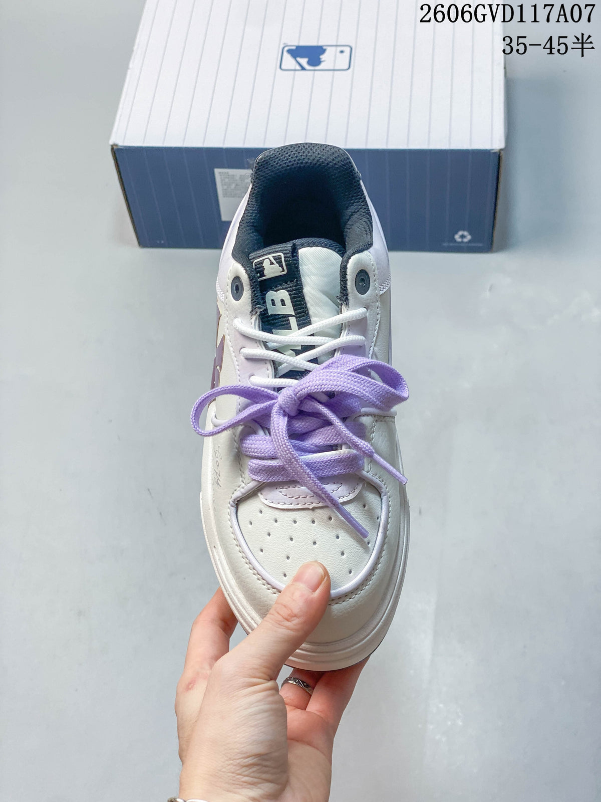 Top view of the sneaker showing its perforated toe and lavender laces
