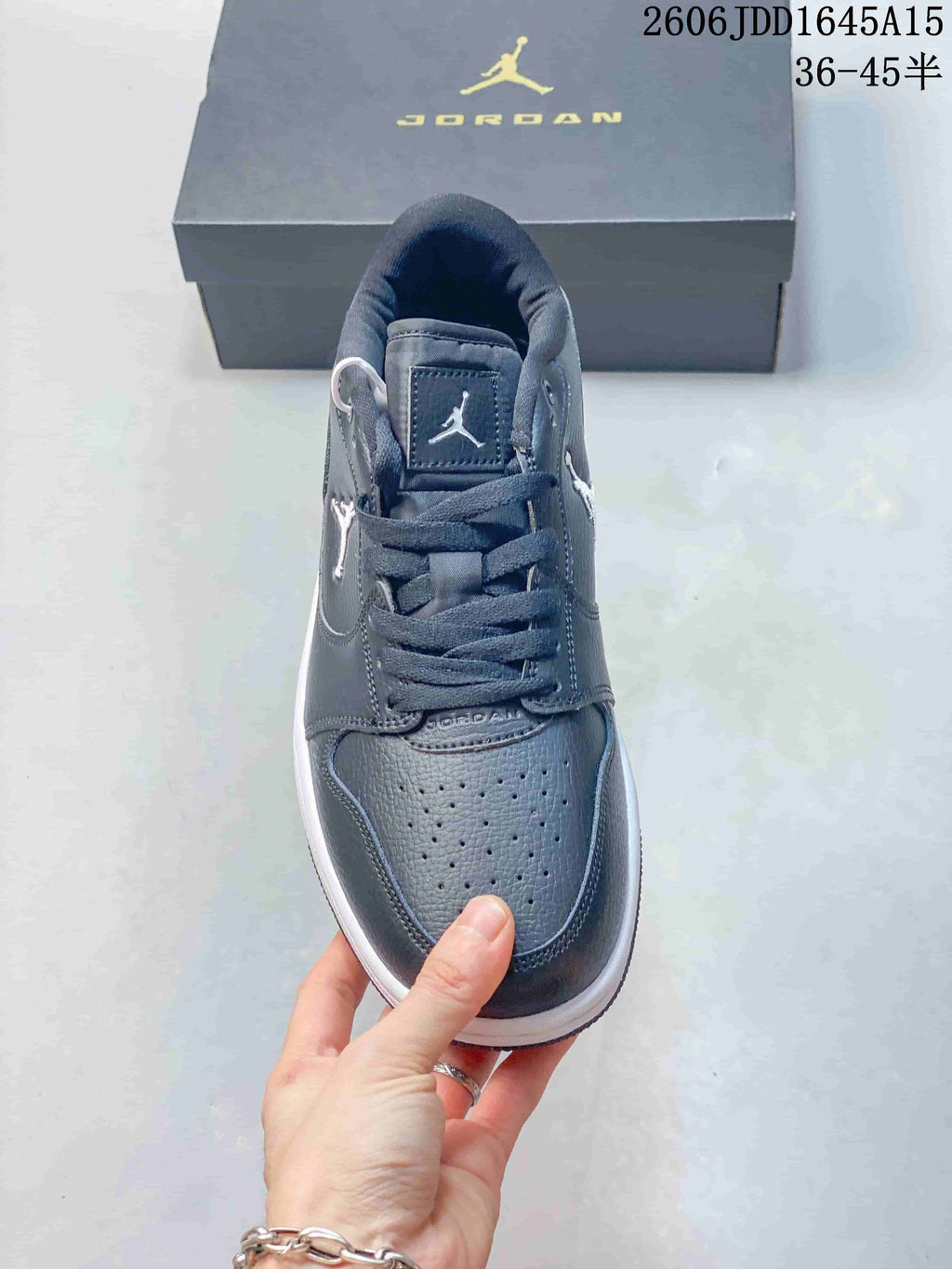 Top view of a Jordan Court Connect sneaker showing laces and perforated toe