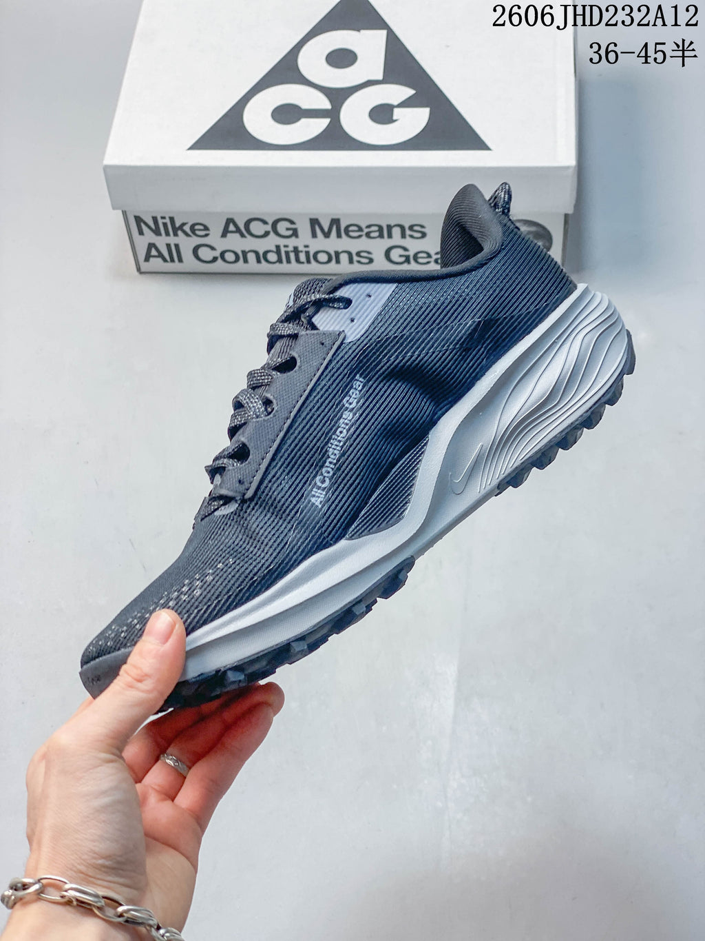 Side profile of the shoe showing its Swoosh, laces, and white midsole