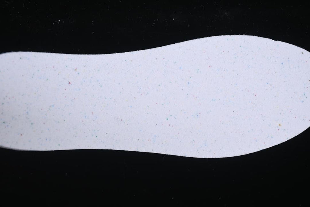 Close-up of a light-colored shoe insert.