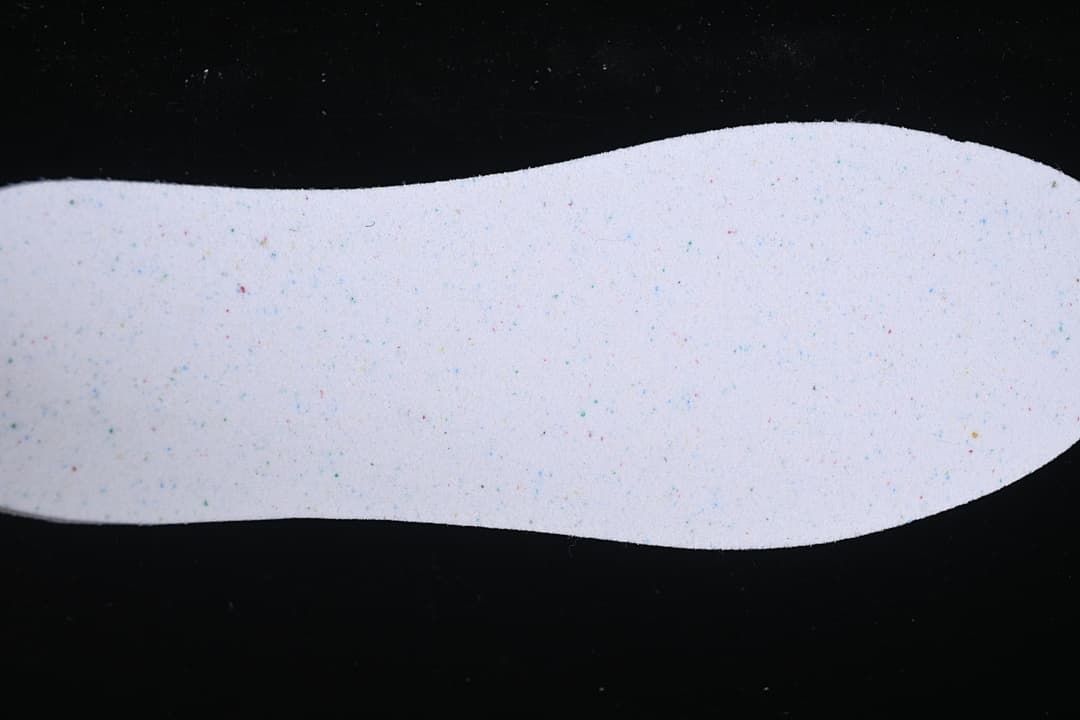 Close-up of a light-colored shoe insert.