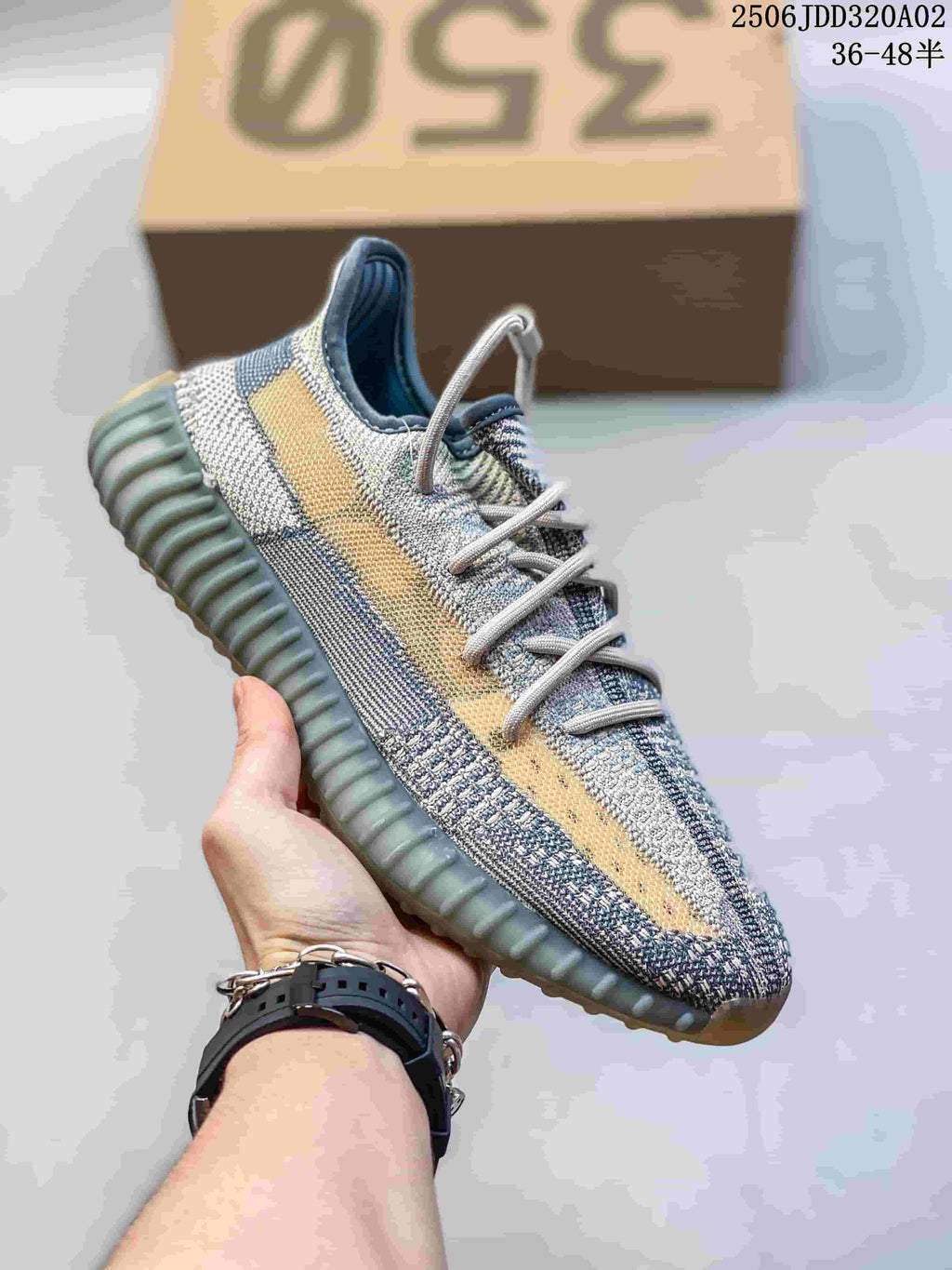 Angled side view showing the contrasting stripe and ribbed sole