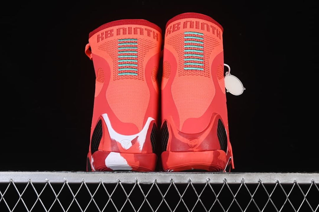 Rear view of both shoes with teal heel accents