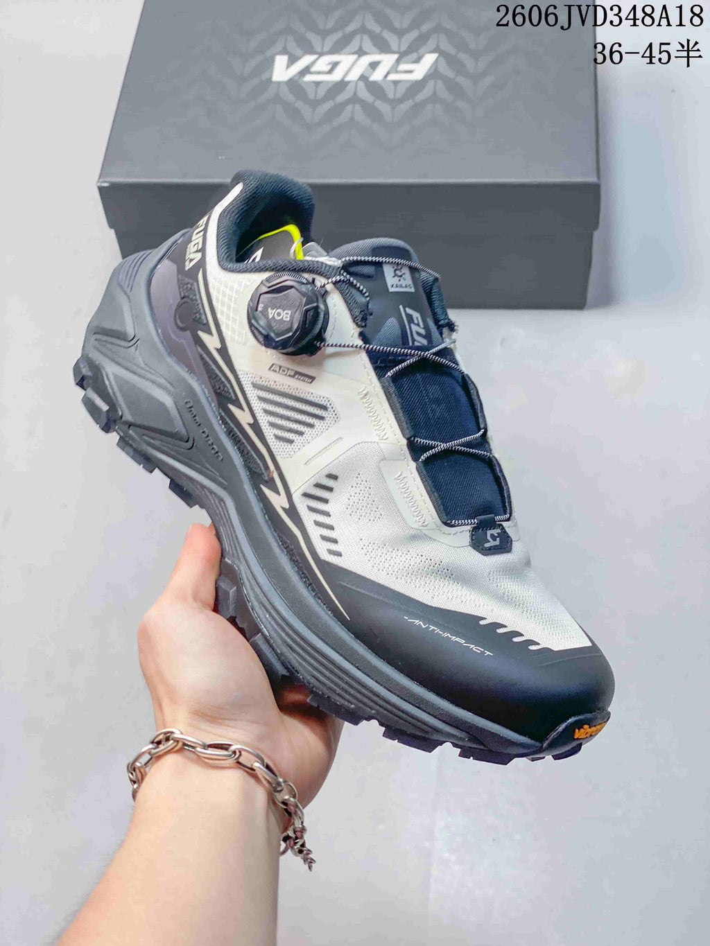Angled view of a Kailas FUGA EX3 trail shoe showing its dial closure and lugged outsole.