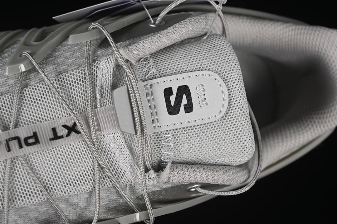 Top close-up of the tongue, mesh-like surface and lace system