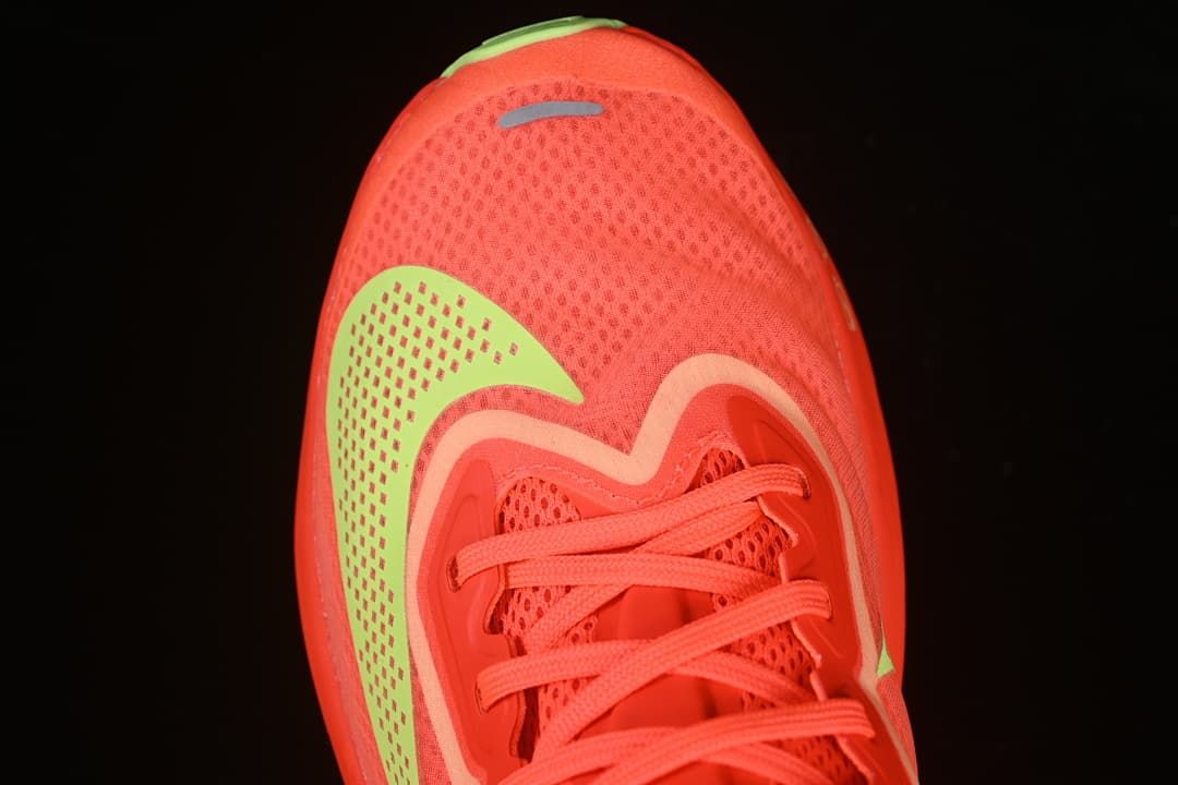 Top view of mesh toe, laces and lime side accents