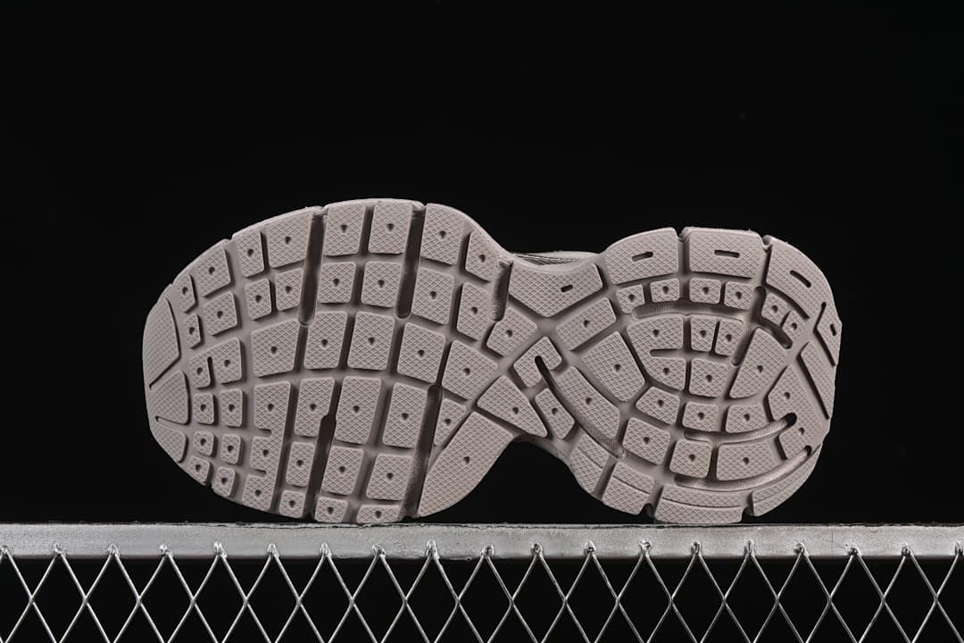 Underside view showing the segmented tread pattern