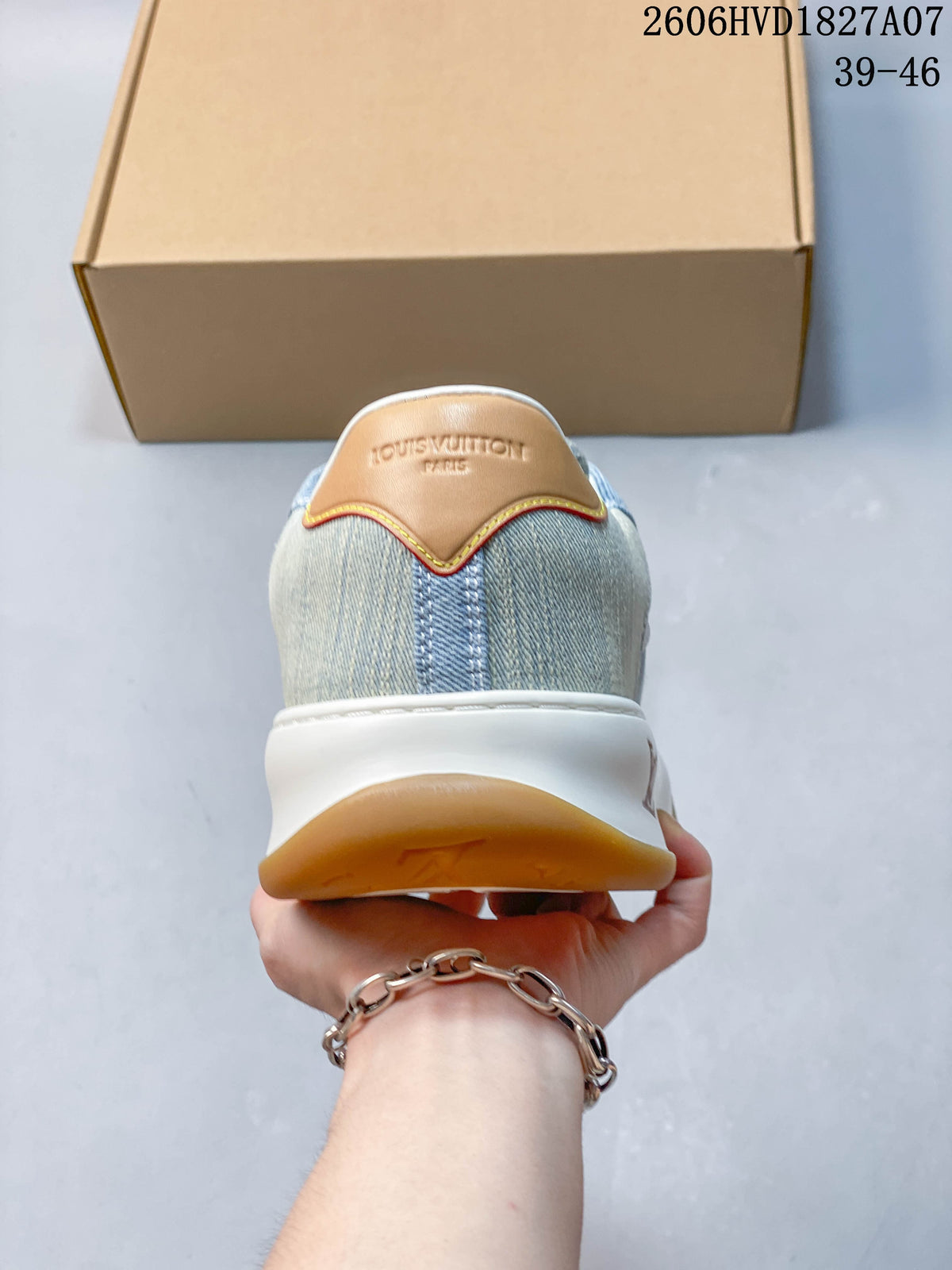 Rear view of the sneaker with a tan heel tab and Louis Vuitton lettering.