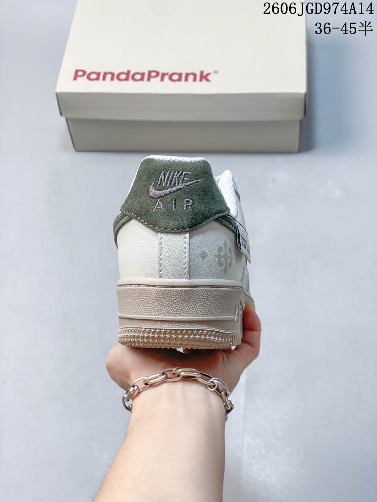 Rear view showing dark green heel detail and raised beige-toned sole