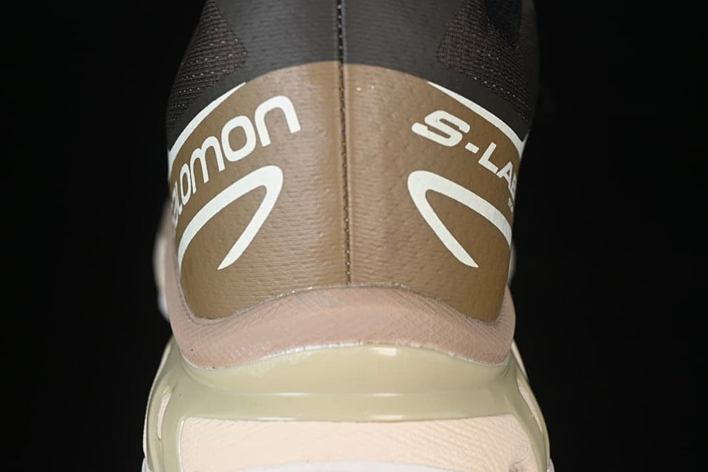 Rear view showing the brown heel panel and sculpted midsole.